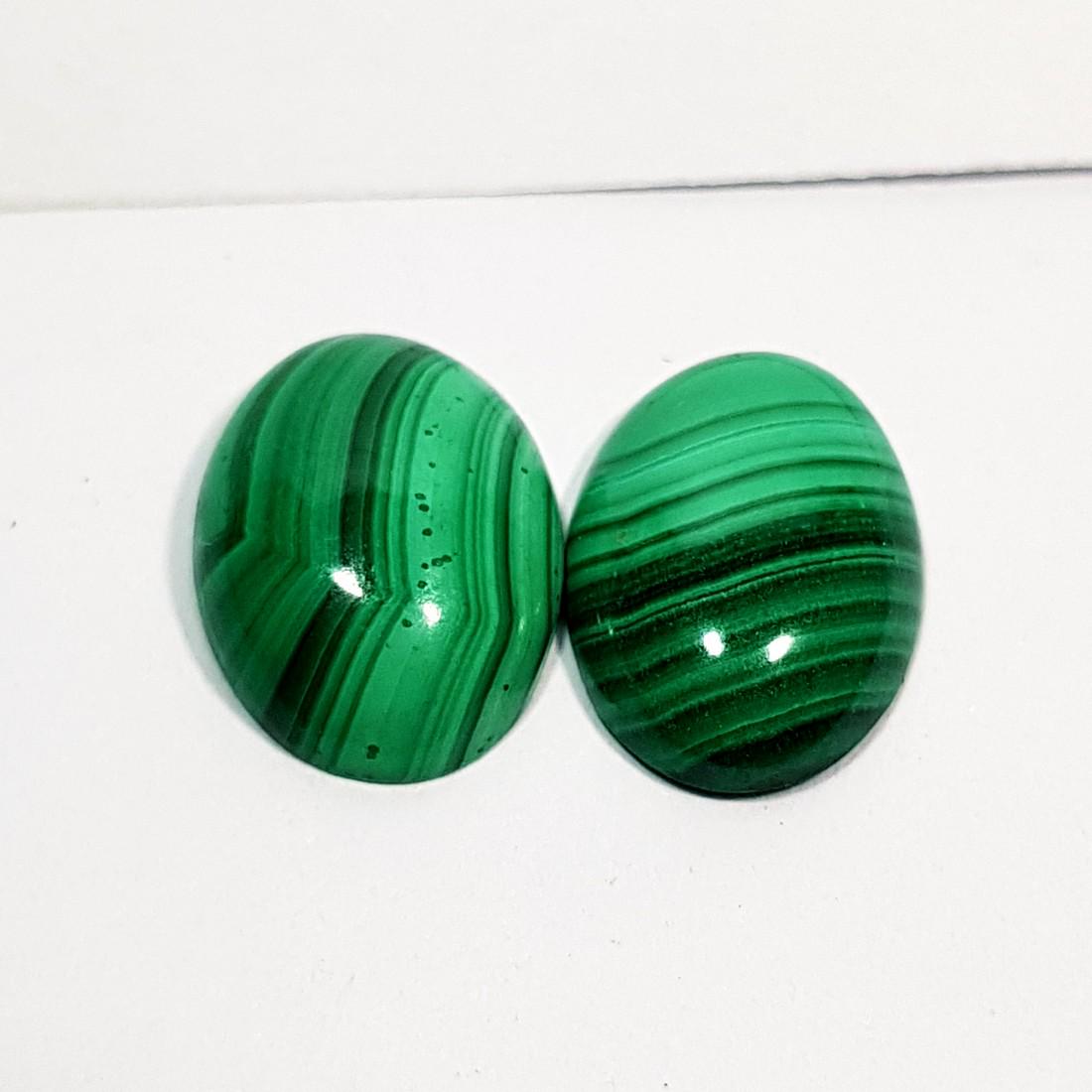 2 Pcs of Wonderful Oval Cut Natural Malachite - 11.00: Item: 2 Pcs of Wonderful Oval Cut Natural Malachite - 11.00 ct Color/Clarity: Opaque Loose gemstone: Carat Weight: 11 Size (mm): 13.80 x 10.00 x 4.30 / 13.80 x 9.90 x 3.50 Oval - Africa No Reserve: Th