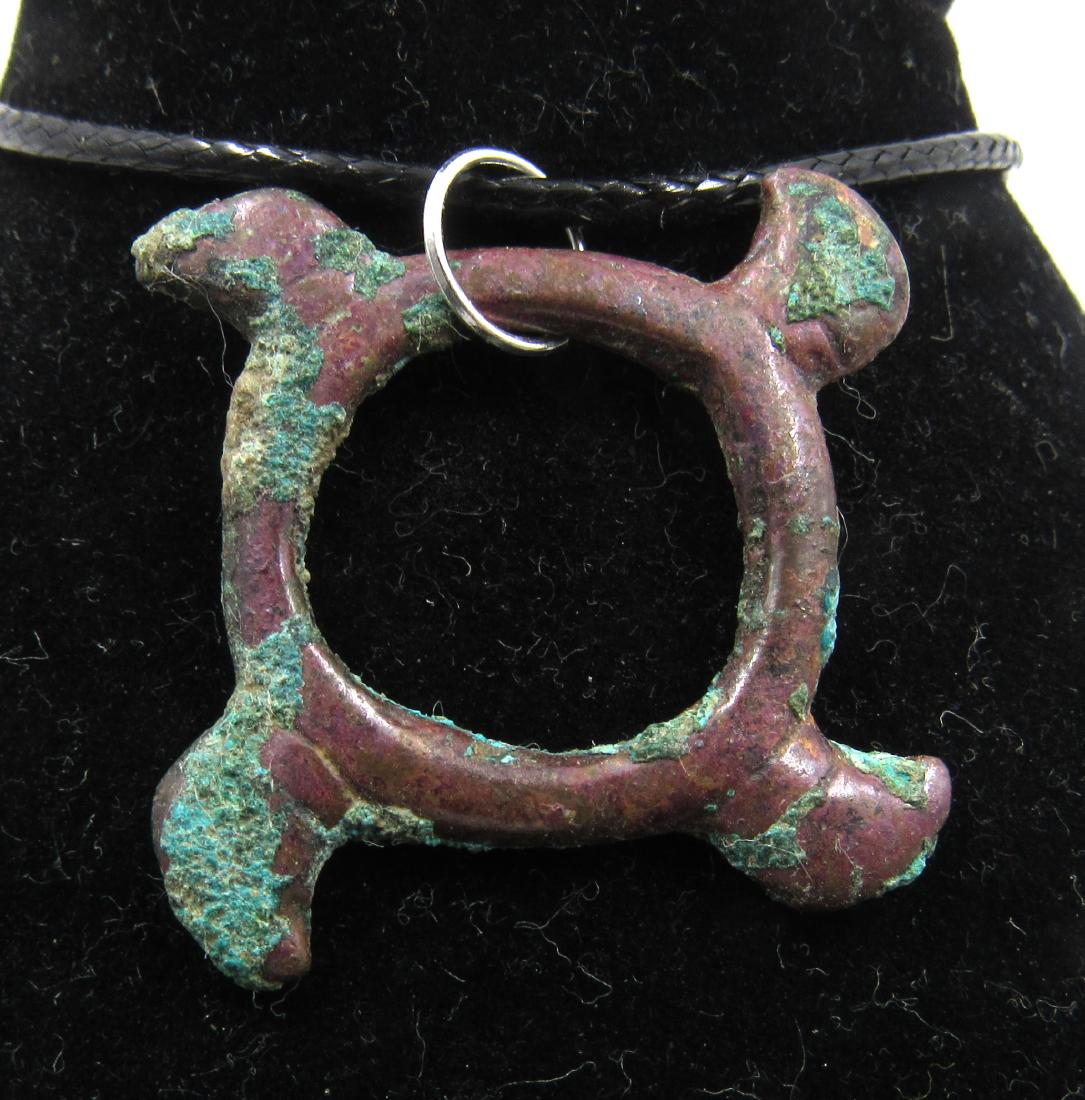 Medieval Viking Era Bronze Eagle Swastika Amulet: Medieval Viking Era Bronze Eagle Swastika Amulet Circa 900 – 1100 AD Medieval Viking Era Bronze Eagle Swastika Amulet. This item has been professionally cleaned to show original details, and include
