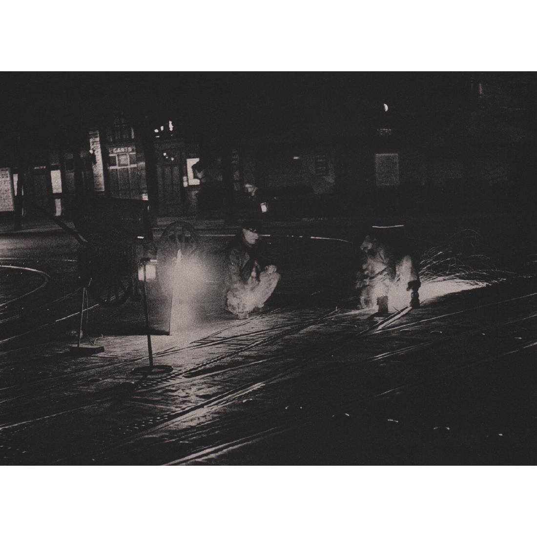 BRASSAI - Workmen Polishing the Rails: Artist: BRASSAI Print Title: Workmen Polishing the Rails Medium: Sheet-fed Gravure Printing Date: 1980's Printed in France Image size approx. 8.5 X 6.5 inches Brassai was a Hungarian–French photogra