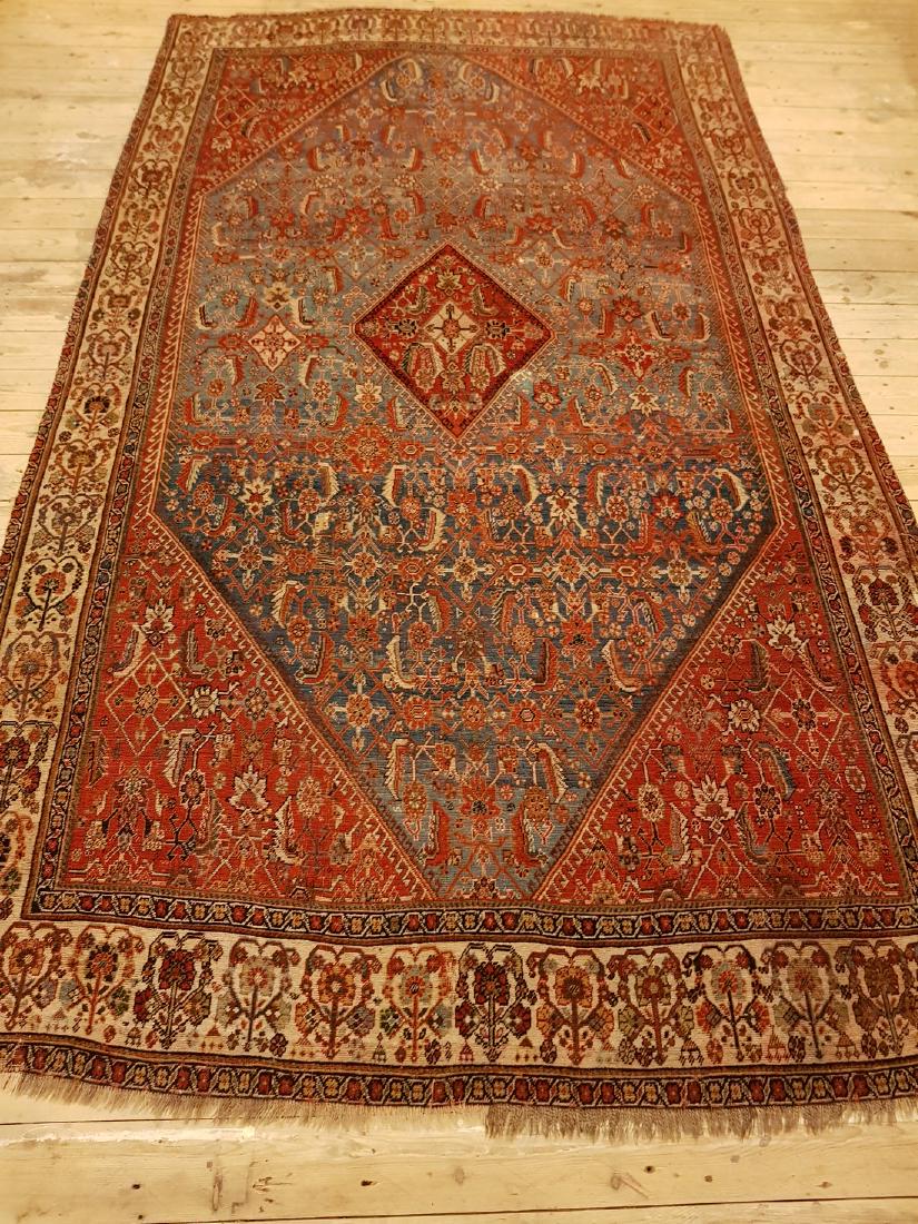 Persian Antique Ghashghai Rug 8.7x4.11: This carpet is knotted by nomads from the highlands in southwestern Persia. The carpet has a very high knot density for a nomad carpet and the motifs are among the most exciting and varying in carpets