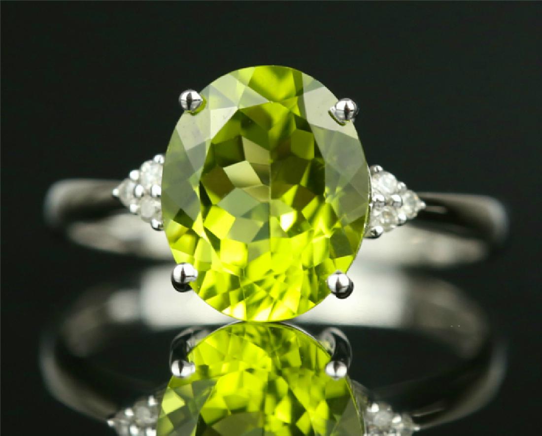 Au750 white gold ring with Peridot 3.095ct.and diamonds (1 of 6)