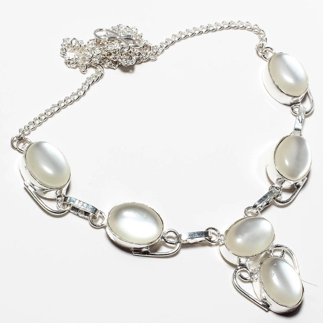 WHITE CAT EYE 925 SILVER NECKLACE 16-18": WHITE CAT EYE 925 SILVER NECKLACE 16-18" MAIN_STONE : WHITE CAT EYE LENGTH_INCHES : 16-18 Inch METAL : Sterling Silver METAL-PURITY : 925 Parts Per 1000 No Reserve: This lot starts at $1 and has no re