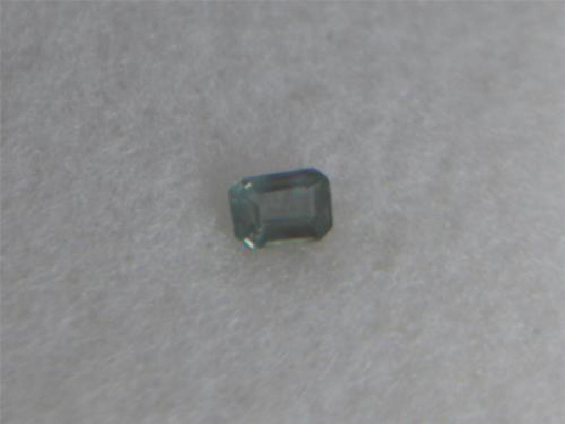.25 ct Alex w/report: Pieces: 1 Shape: Emerald Facet Type: Alexandrite (Chrysoberyl family) Color: Grayish Green in natural and florescent lighting to a muted grayish reddish color in incandescent lighting Avg color change