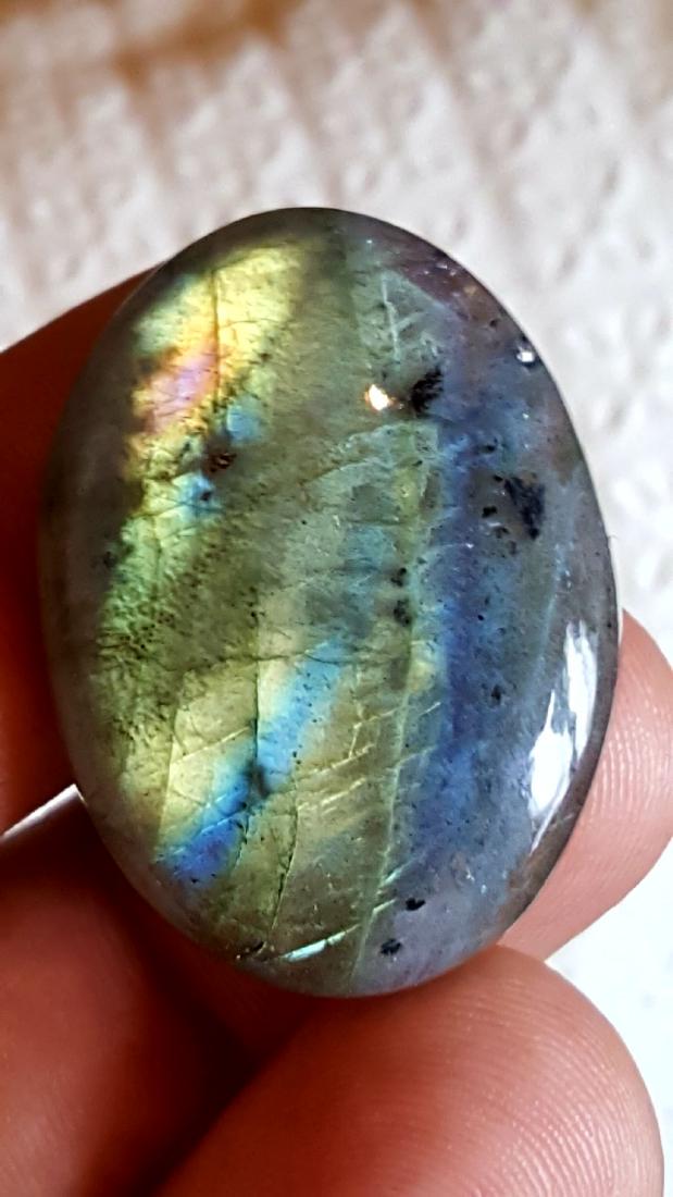 SUPREME QUALITY NATURAL LABRADORITE IN EXCELLENT: Item: SUPREME QUALITY NATURAL LABRADORITE IN EXCELLENT CUTTING Origin: africa Weight: 36 carat No Reserve: This lot starts at $1 and has no reserve as a courtesy so that collectors can determine the t