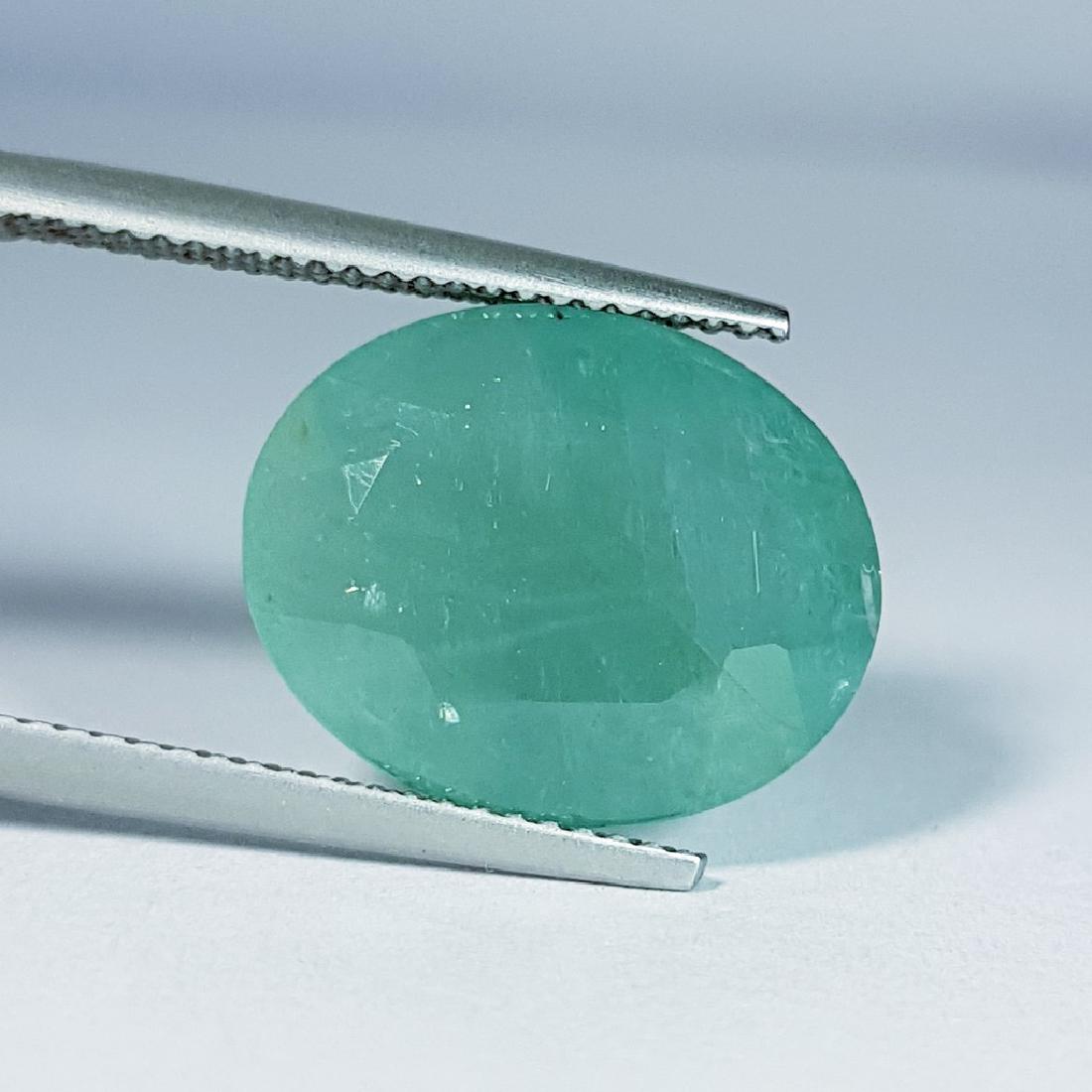 Grandidierite - 9.08 ct: Item: Grandidierite - 9.08 ct Color/Clarity: SI Loose gemstone Carat Weight: 9.08 Size (mm): 15.80 x 12.80 x 7.80 Oval - Madagascar No Reserve: This lot starts at $1 and has no reserve as a courtesy s