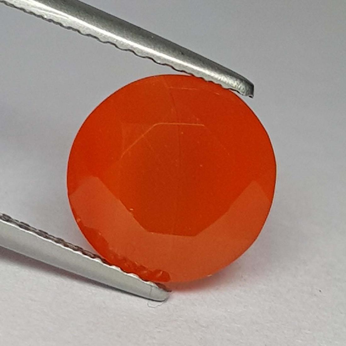 Beautiful Color Round Cut Natural Carnelian - 2.58 ct: Item: Beautiful Color Round Cut Natural Carnelian - 2.58 ct Loose gemstone Carat Weight: 2.58 Size (mm): 9.00 x 9.10 x 6.20 Round - Brazil No Reserve: This lot starts at $1 and has no reserve as a cou