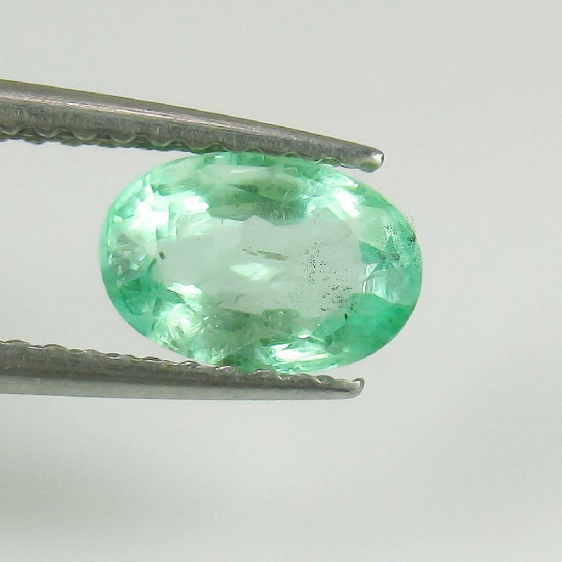 0.84 Ct Genuine Colombian Emerald Nice Oval cut: Item: 0.84 Ct Genuine Colombian Emerald Nice Oval cut Loose Gemstone: Natural Emerald Oval Stone Clarity: SI Carat Weight: 0.84 Size/Dimensions: 7.30 x 5.00 x 3.70 mm Nice Oval cut / Light Green / Ver