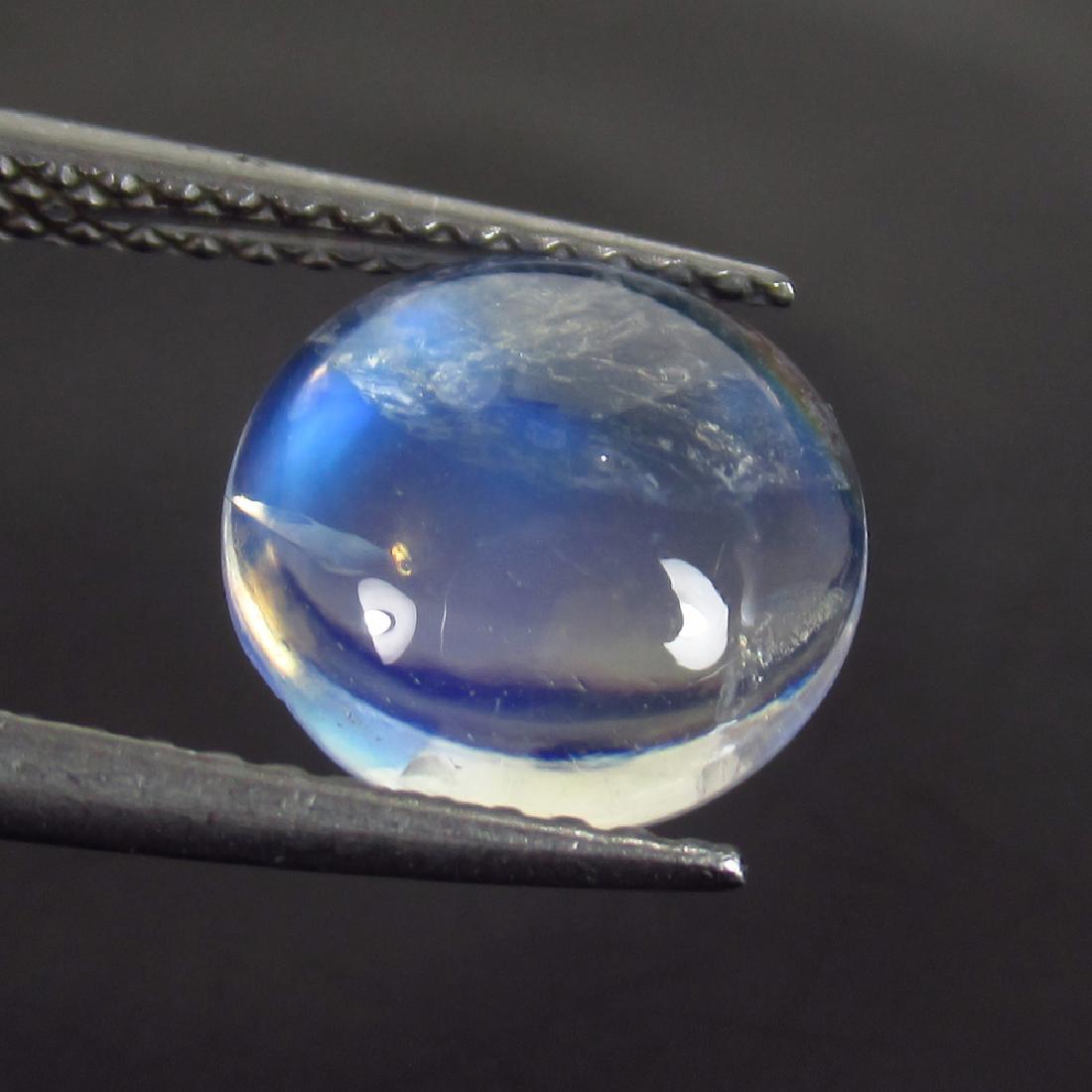 1.98 Ct Genuine Blue Moonstone 9 mm Round Cabochon Blue: Item: 1.98 Ct Genuine Blue Moonstone 9 mm Round Cabochon Blue Tint Loose Gemstone: Natural Blue Moonstone Round Stone Clarity: Transparent Carat Weight: 1.98 Size/Dimensions: 9.00 x 9.00 x 8.70 mm Blu