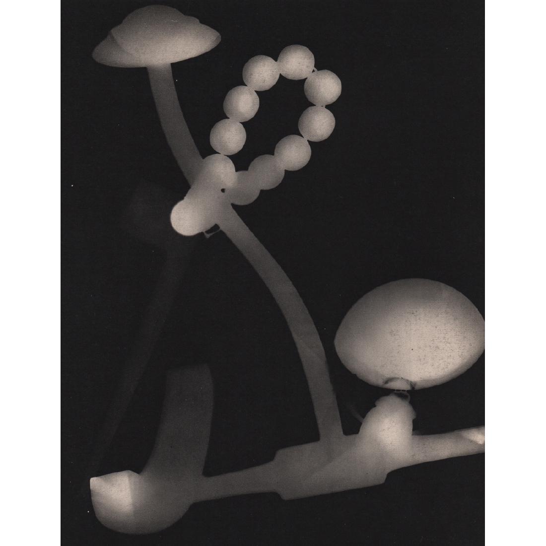 MAN RAY - Rayograph: Artist: MAN RAY Print Title: Rayograph Medium: Sheet-fed Gravure Printing Date: 1930's Printed in France Image size approx. 7.5 x 9.75 inches Man Ray, original name Emmanuel Radnitzky, was born on Aug