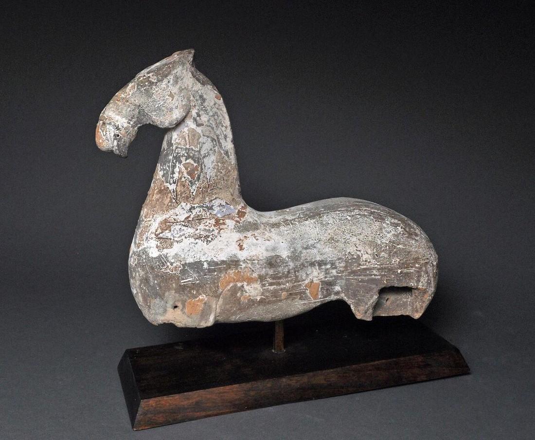 Han Dynasty Horse: Item: Han Dynasty Horse Date: 206 BC - 220 AD Materials: ceramic Size: 12” long x 10” high Please note that this lot has a confidential reserve. When you leave a bid in advance of the auction, sub