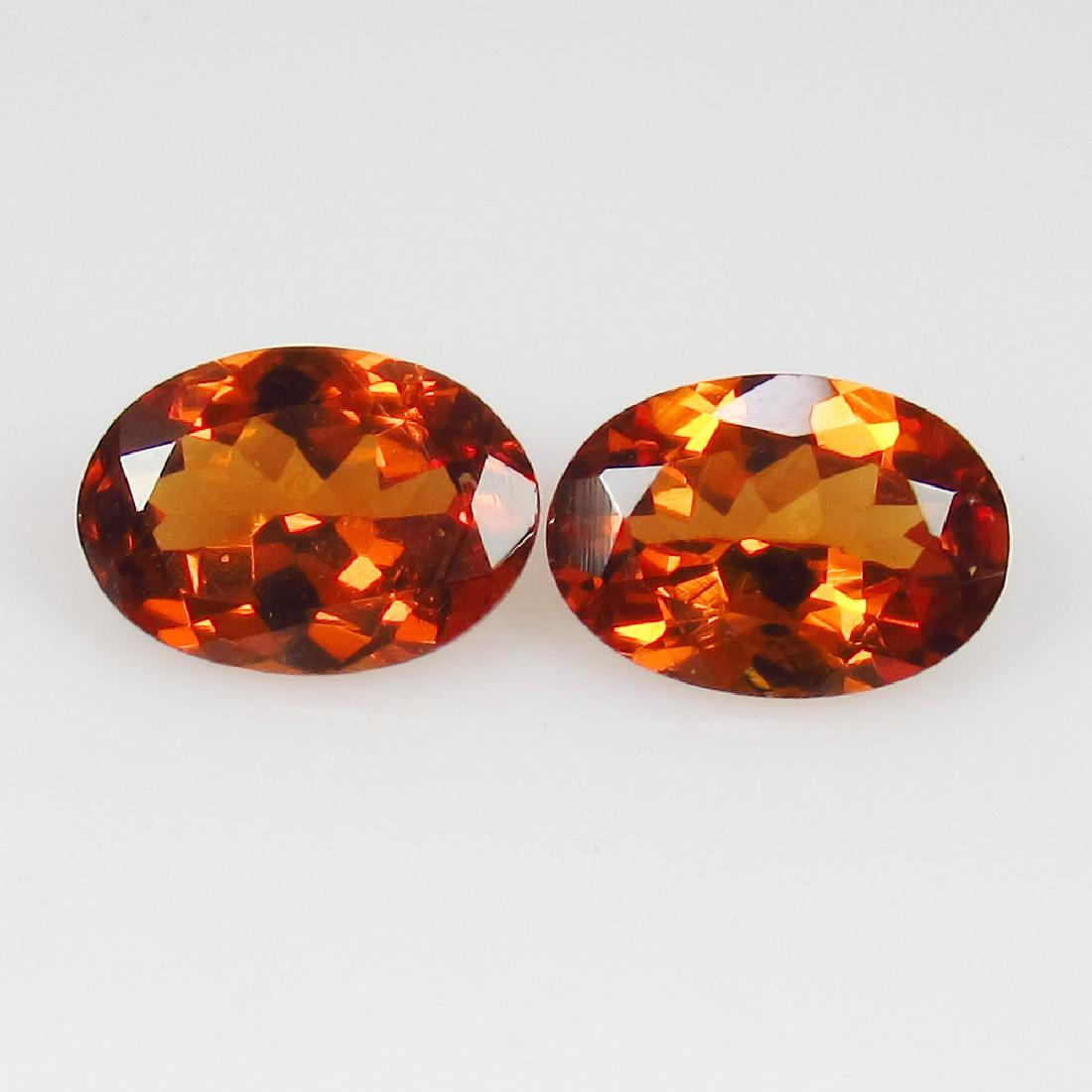 1.44 Ct Genuine Spessartite Garnet 7X5 mm Matching Oval (1 of 2)