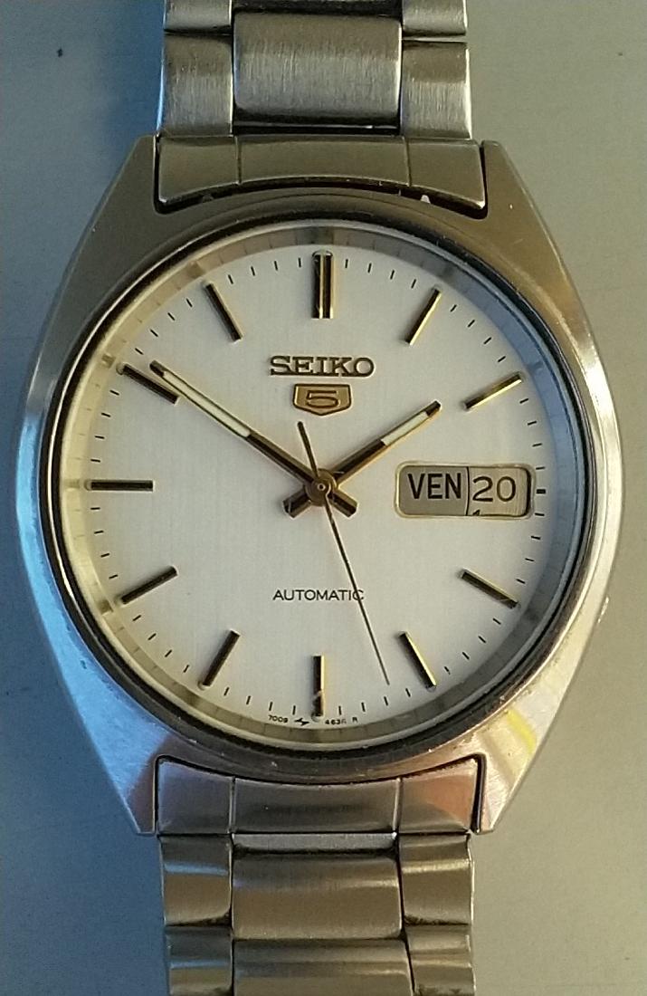 Seiko 5 Automatic: Seiko 5 Automatic Wristwatch Mechanism: Automatic Case material: Steel Case diameter: 36 mm Strap material: Steel Dating function Period: 70s Perfectly functioning No Reserve: This lot starts at $1 an