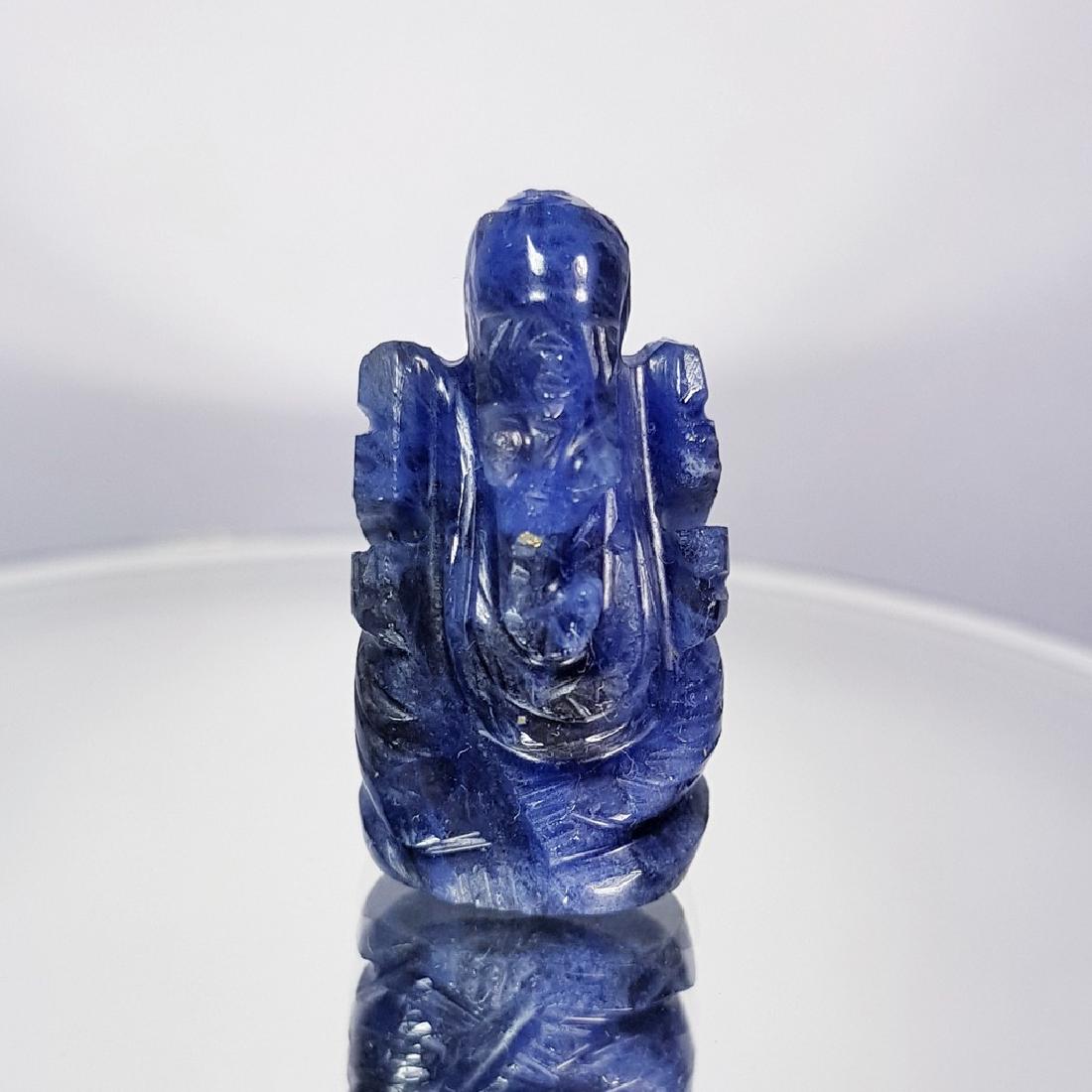Sodalite Lord Ganesha Carving - 34.23 ct: Item: Sodalite Lord Ganesha Carving - 34.23 ct Loose gemstone Color/Clarity: VVS Carat Weights: 34.23 Size (mm): 26.85 x 6.10 x 4.80 Africa No Reserve: This lot starts at $1 and has no reserve as a co