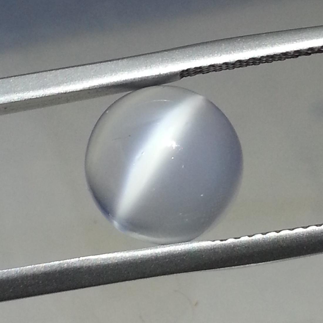 Natural Moonstone Cat's Eye- 4.39 ct: Item: Natural Moonstone Cat's Eye- 4.39 ct Loose gemstone Color/Clarity: VVS Carat Weights: 4.39 Size (mm): 10.04 x 10.04 x 5.75 Round - Srilanka No Reserve: This lot starts at $1 and has no reserve a