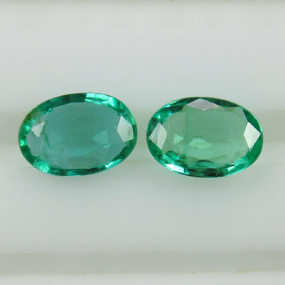 0.72 Ct Genuine Zambian Emerald Matching Oval Pair (1 of 2)