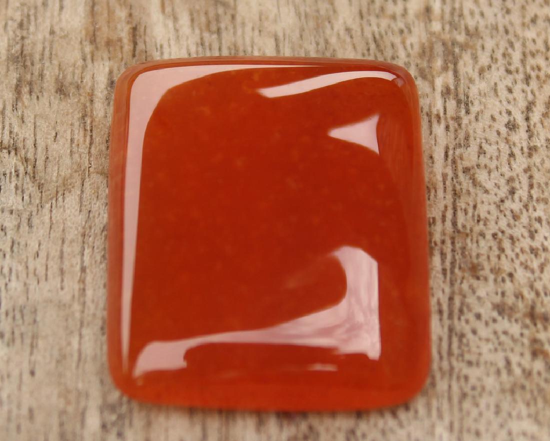 35.20 Ct Natural Carnelian: Gemstone : Natural Carnelian Origin : India Weight: 35.20 carats Dimensions: 26x21.5x6.3 mm Shape : Rectangular Cabochon Color: orange Transparency: translucent Treatment: none No Reserve: This lot st