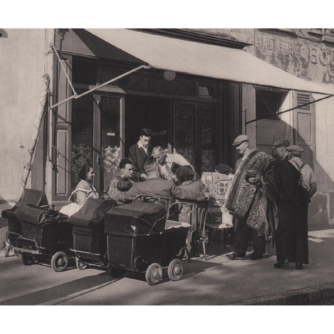 ROBERT DOISNEAU - Sunday in the Suburbs: Artist: ROBERT DOISNEAU Print Title: Sunday in the Suburbs with the Family Medium: Sheet-fed Gravure Printing Date: 1940's Printed in Switzerland Image Size: 6.5 x 5.25 inches Robert Doisneau (1912-19