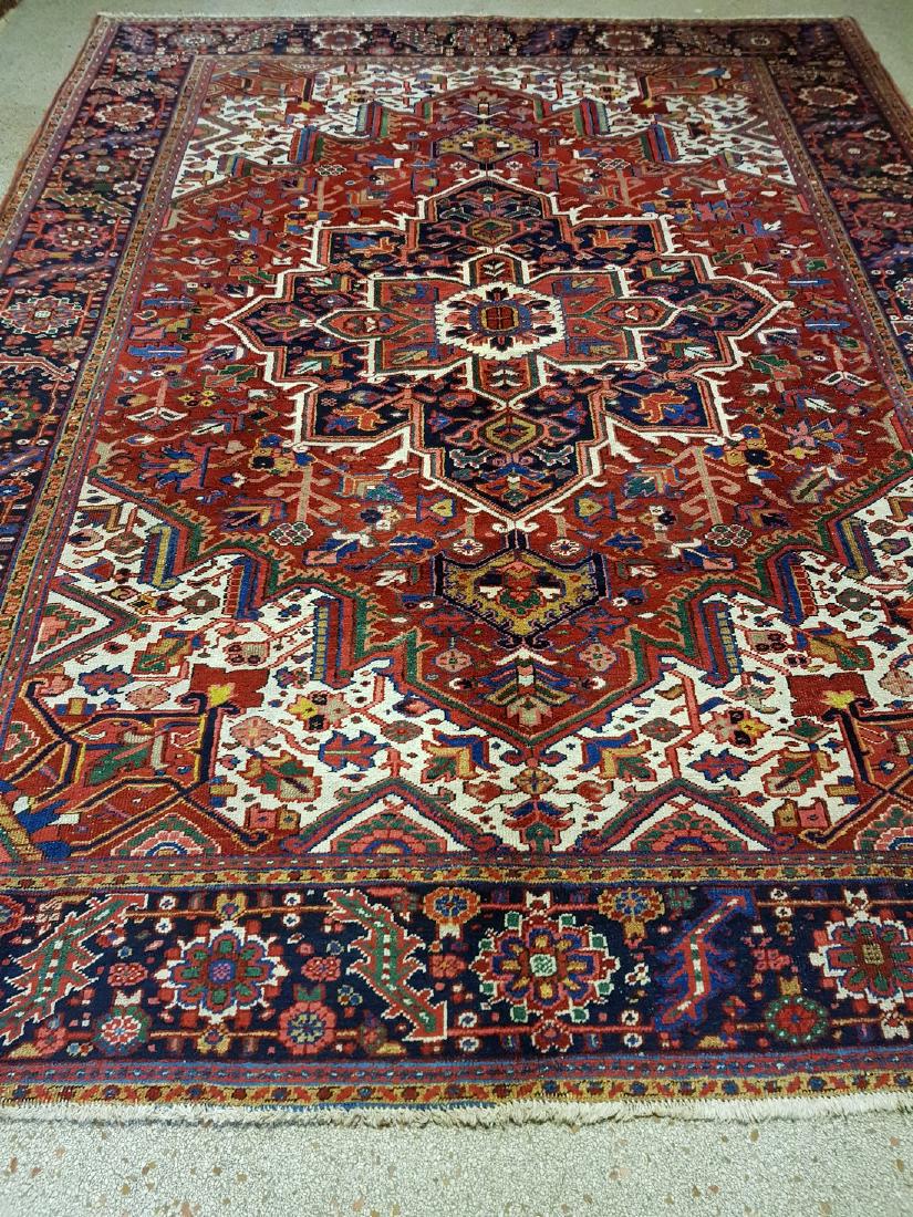 Persian Antique Heriz Rug 11.8x7.11: Title: Persian Antique Heriz Rug Origin (City & Country): Iran Size/ Format: 344 x 243 cm Material: wool Age: 1920 This carpets is knotted in northwestern Persia. The carpet is often large and very du
