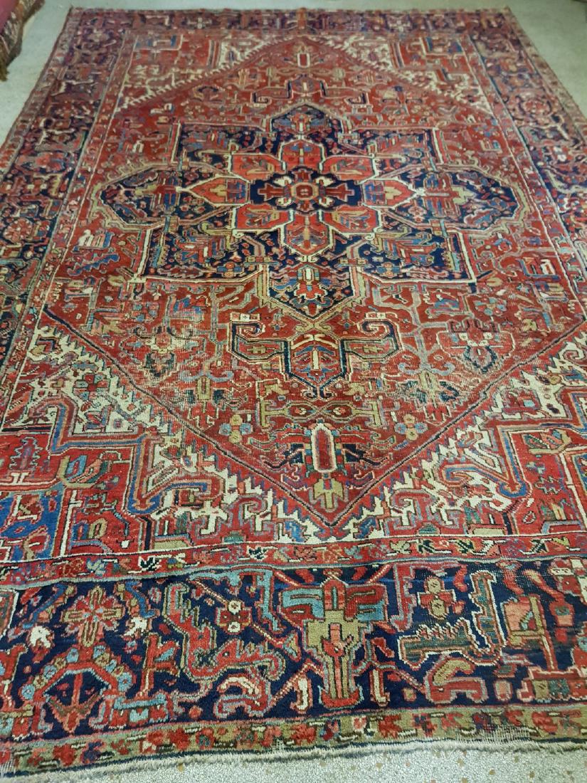 Persian Antique Heriz Rug 11.8x7.11: Title: Persian Antique Heriz Rug Origin (City & Country): Iran Size/ Format: 357 x 242 cm Material: Wool Age: 1920 This carpets is knotted in northwestern Persia. The carpet is often large and very du