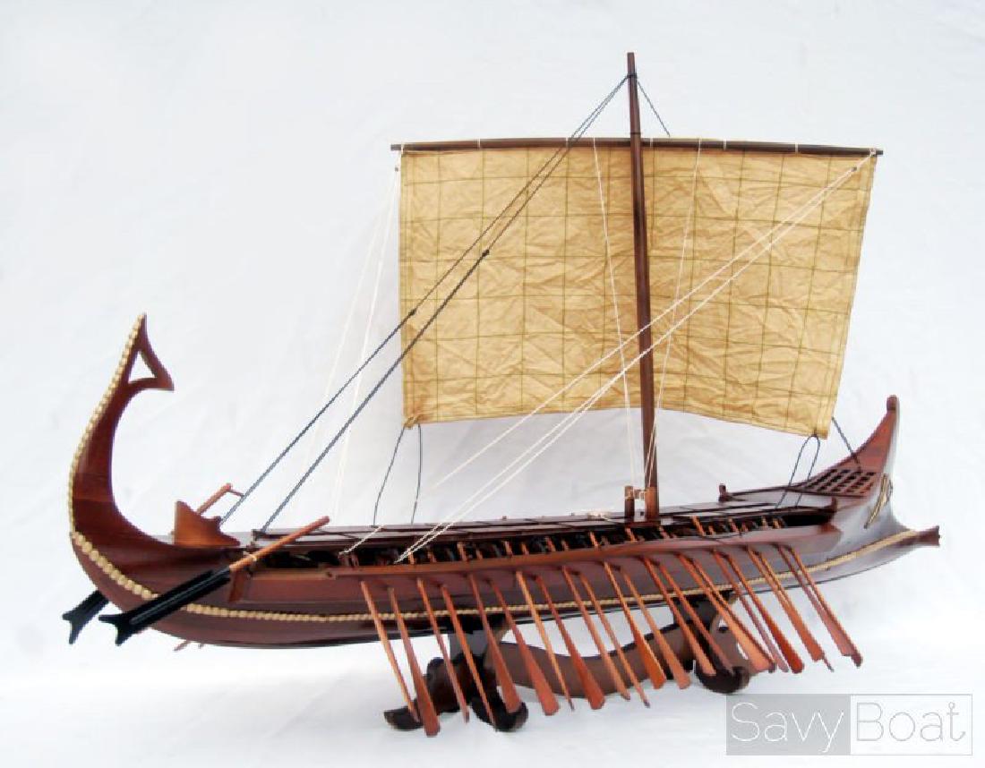 Bireme Model Boat: Description Handcrafted by master artisans using plank-on-frame construction Real metal fittings Amazingly detailed replica The model is a perfect gift for home or office decoration. Dimension approx.