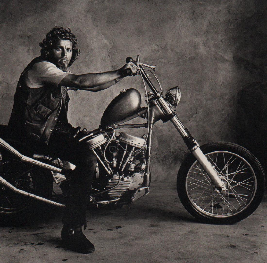 IRVING PENN - Hell's Angel (Doug),SF,1967: Artist: IRVING PENN Print Title: Hell's Angel (Doug),SF,1967 Medium: Quad-tone Photoengraving Printed 1991 in the US Image size (inches) approx. 8 x 8” Irving Penn was an American photographer known