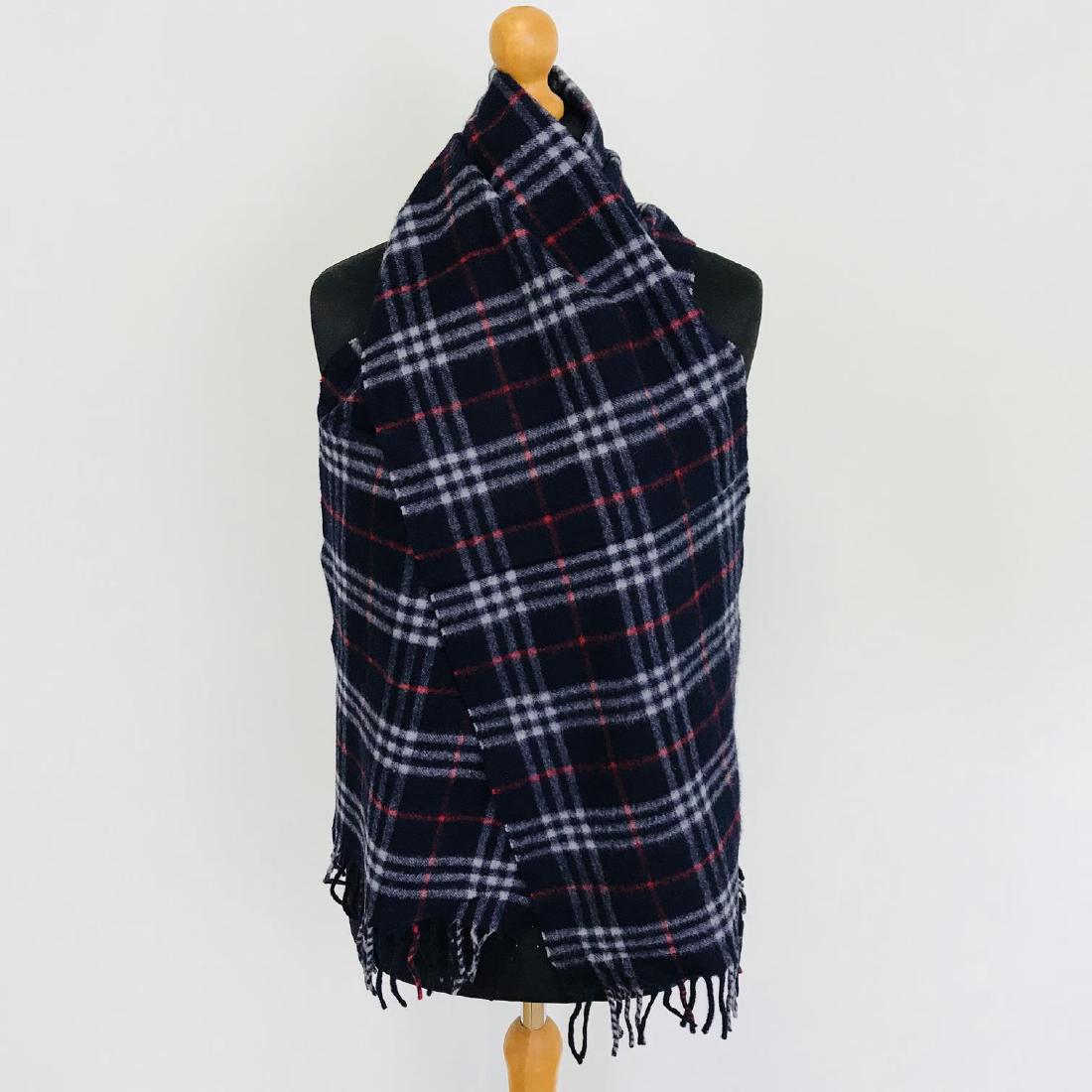 Vintage Burberry Cashmere and Lambswool Blend Scarf: Vintage Burberry Cashmere and Lambswool Blend Scarf Vintage Cashmere and Lambswool Blend Color: Dark Blue Measurements: 69 x 12.5 in. Please note that this lot has a confidential reserve. When you lea