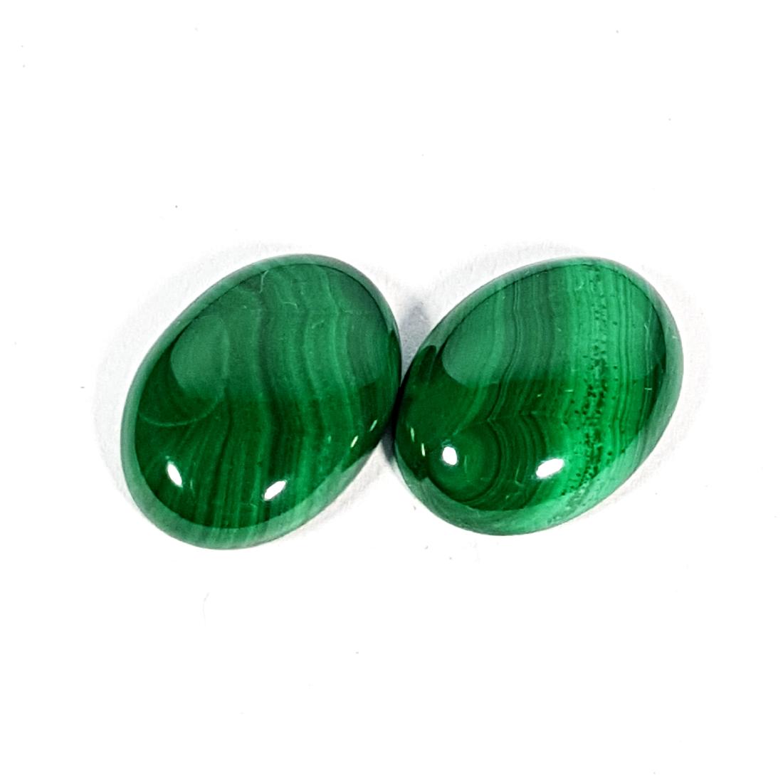 2 Pcs of Wonderful Oval Cut Natural Malachite - 12.26: No Reserve! Item: 2 Pcs of Wonderful Oval Cut Natural Malachite - 12.26 ct Color/Clarity: Loose gemstone Carat Weight: 12.26 Size (mm): 14.00 x 10.00 x 3.50 Oval - Africa No Reserve: This lot starts a