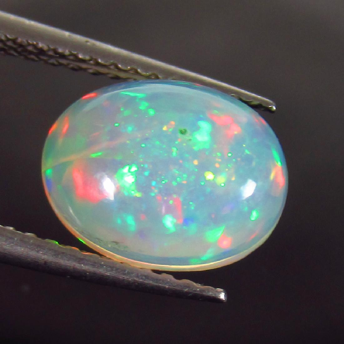 1.56 Ct Genuine Ethiopian Multi-Color Fire Opal Oval (1 of 2)