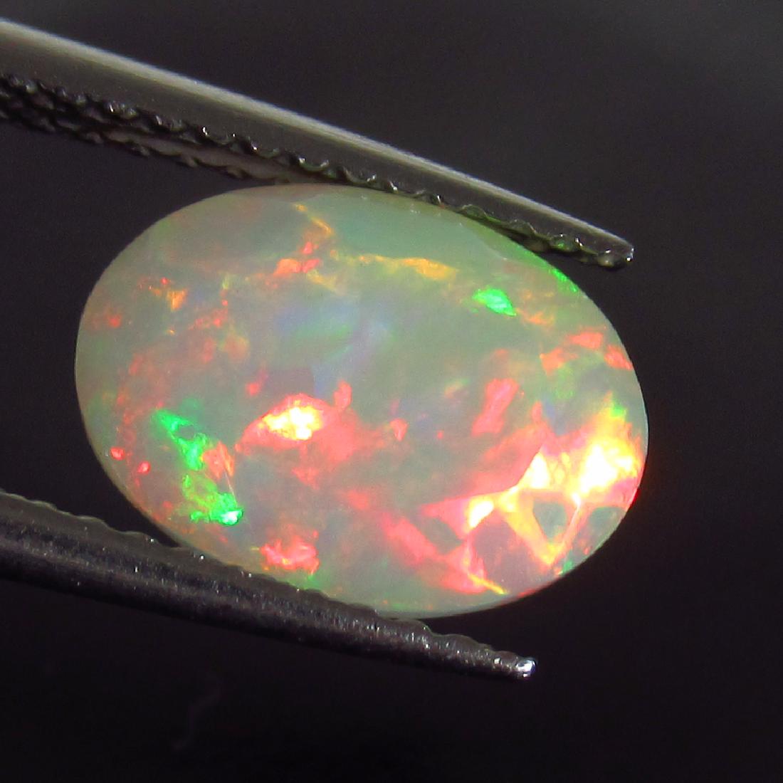 1.47 Ct Genuine Ethiopian Multi-Color Fire Faceted Opal (1 of 2)