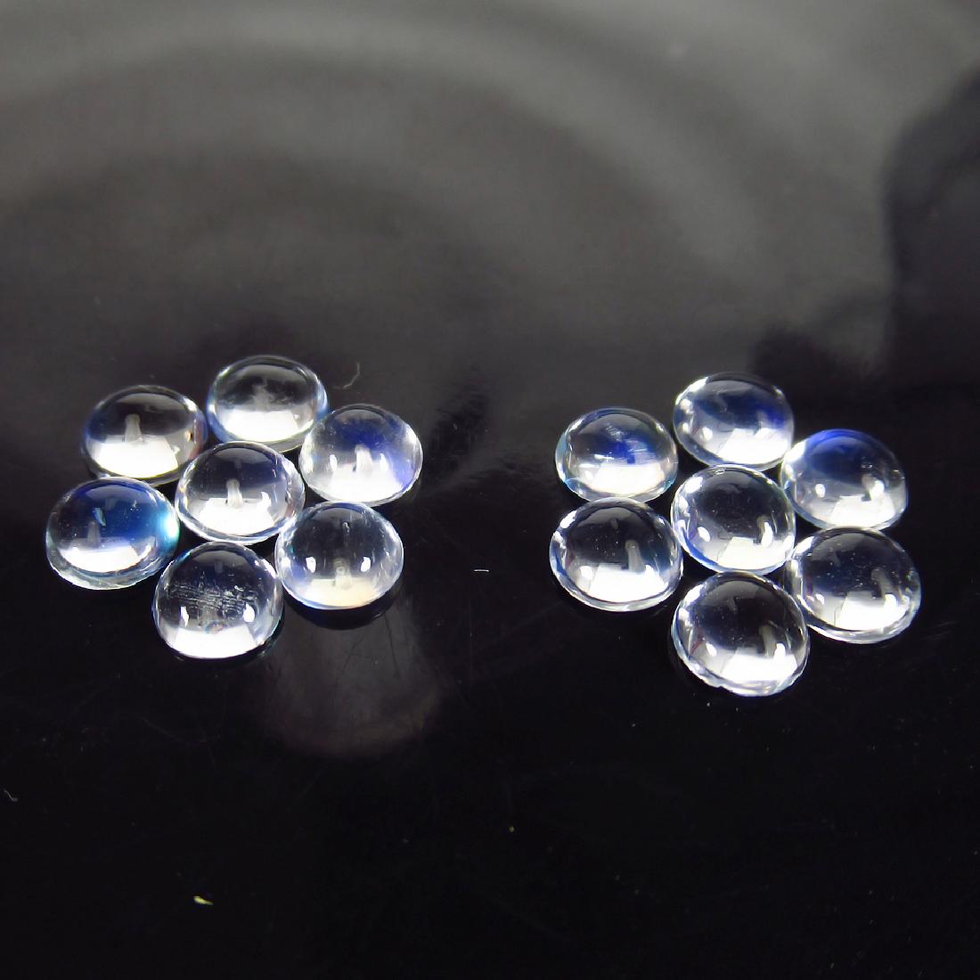 5.57 Ct Genuine 14 Moonstone Matching Round Cabochon: No Reserve! Item: 5.57 Ct Genuine 14 Moonstone Matching Round Cabochon Set Loose Gemstone: Natural Moonstone Round Stone Clarity: Transparent Carat Weight: 5.57 Size/Dimensions: 4.80 to 5.00 mm / 14 P