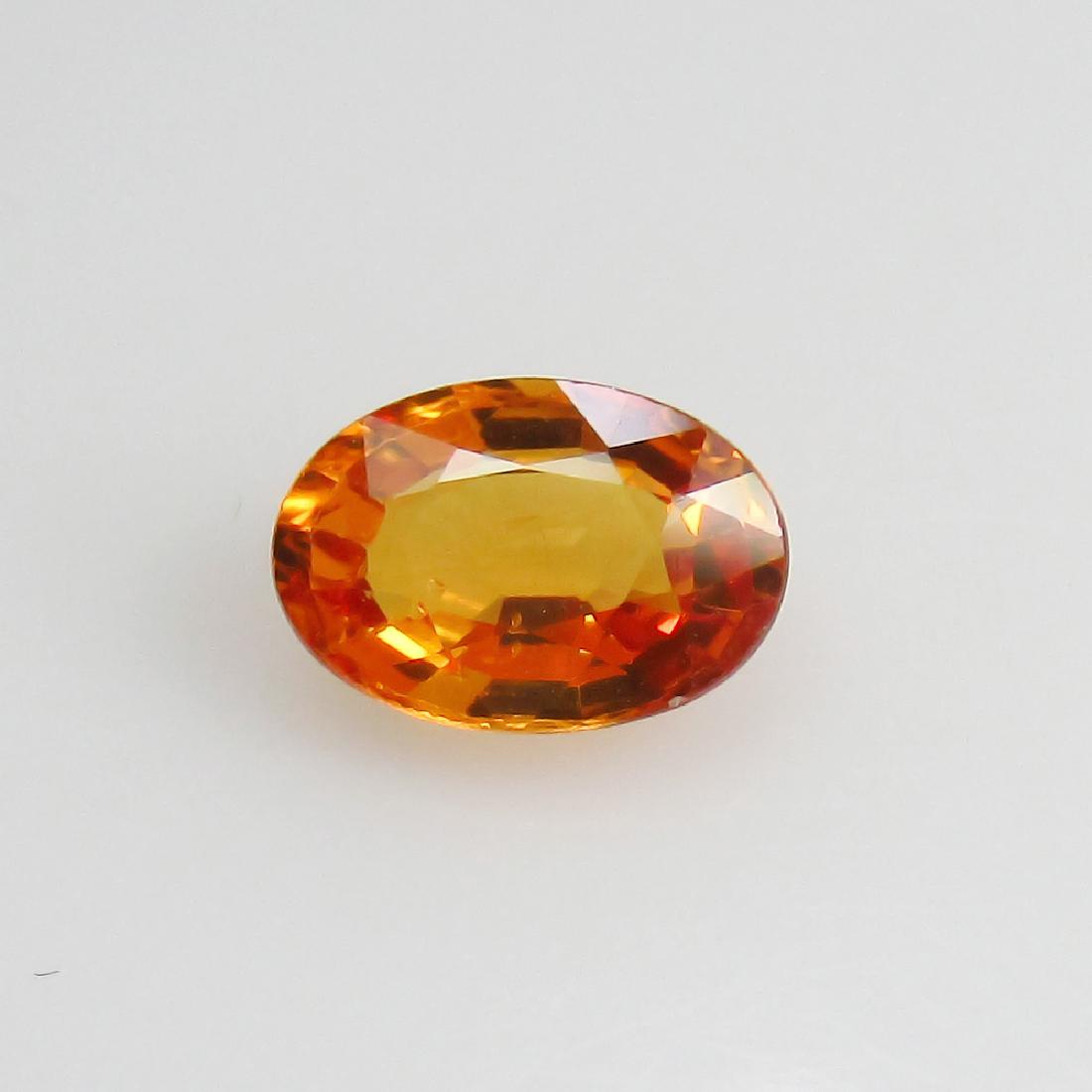 0.64 Ctw Natural Orange Sapphire Oval cut (1 of 2)