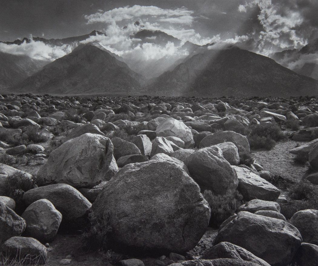 ANSEL ADAMS - Mt. Williamson, Sierra Nevada, 1945: Artist: Ansel Adams Title: Mt. Williamson, Sierra Nevada, 1945 Medium: Duotone Photo Litho, 1990, USA Dimensions: 11.15x9.4" Heat Wax Mounted on 14x18" Conservation board Ansel Adams was an American p