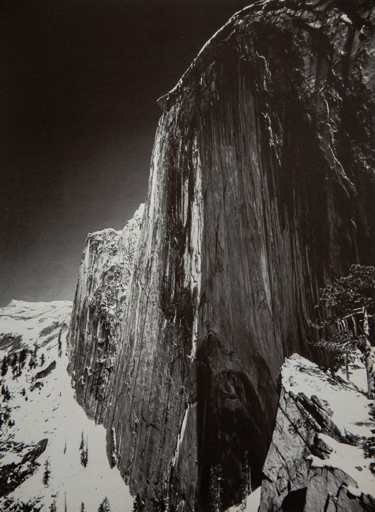 ANSEL ADAMS - Monolith, the Face of Half Dome, 1927: Artist: Ansel Adams Title: Monolith, the Face of Half Dome, Yosemite, 1927 Medium: Duotone Photo Litho, 1974, Italy Dimensions: 8.85x11.95 Heat Wax Mounted on 14x18" Conservation board Ansel Adams was