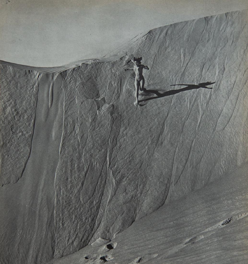 ANDRE DE DIENES - Nude Running Down Sand Dune: Artist: Andre De Dienes Title: Nude Running Down Sand Dune Medium: Sheet Fed Gravure, 1950s, France Dimensions: 8.35x8.85" Heat Wax Mounted on 12x16" Conservation Board Andre De Dienes was a Hungarian