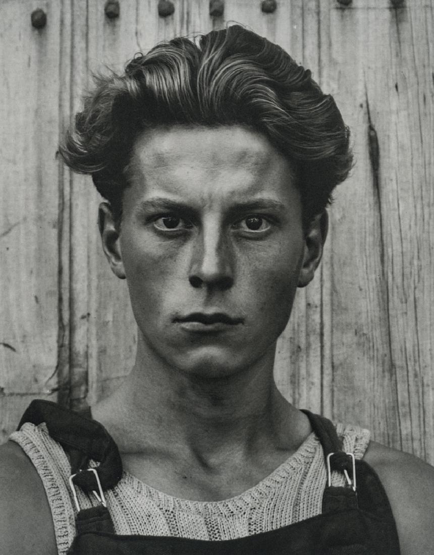 PAUL STRAND - Young Boy, Gondeville, France, 1951: Artist: Paul Strand Title: Young Boy, Gondeville, France, 1951 Medium: Photo Litho, 1976, USA Dimensions: 7x8.95" Heat Wax Mounted on 12x16" Conservation Board Paul Strand (1890 – 1976) was an Ameri