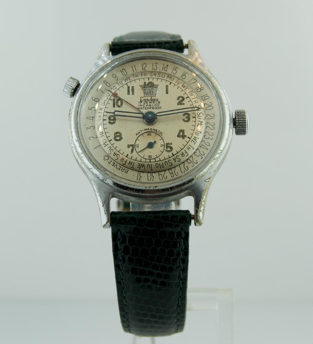Landau Unusual Swiss Multifunction Wristwatch: Reserve Reduced! Watch: Landau Unusual Swiss Multifunction Wristwatch Antimagnetic Swiss Origin: Swiss Date: 1950s Function: Day, month, date on dial, waterproof Movement: Mechanical, manual wind Case