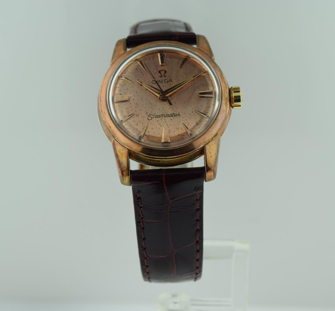 Omega Seamaster Pink Gold Filled Watch: Reserve Reduced! Watch: Omega Seamaster Pink Gold Filled Watch Date: 1960s Movement: Mechanical, hand winding Case Type: Pink gold filled top and stainless steel case back Case Size: 32mm Bracelet Typ