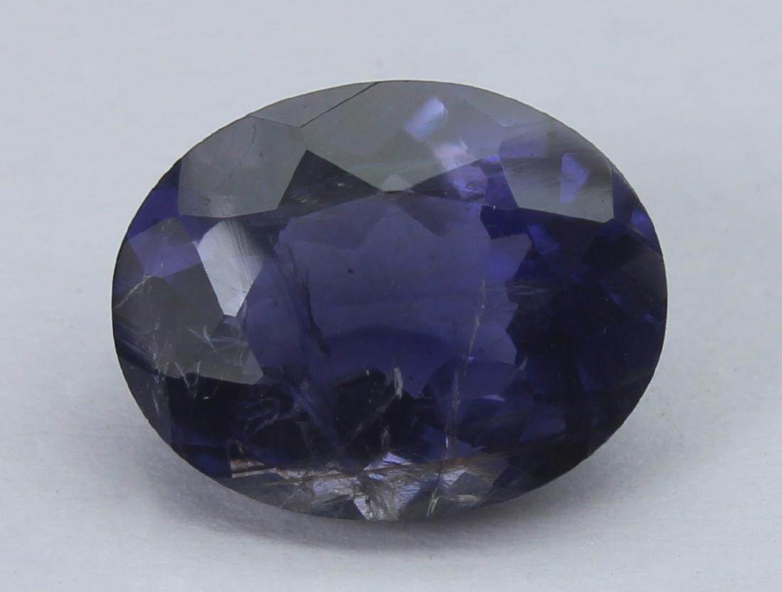2.65 Ct Natural Iolite: No Reserve! Reserve Reduced! Gemstone: Iolite Origin: India Weight: 2.65 Carats Measurements: 10.6x8.4x5.3 mm Shape / Cut: Oval Cut Colour: Violet Blue Transparency: transparent Clarity: Some Natural