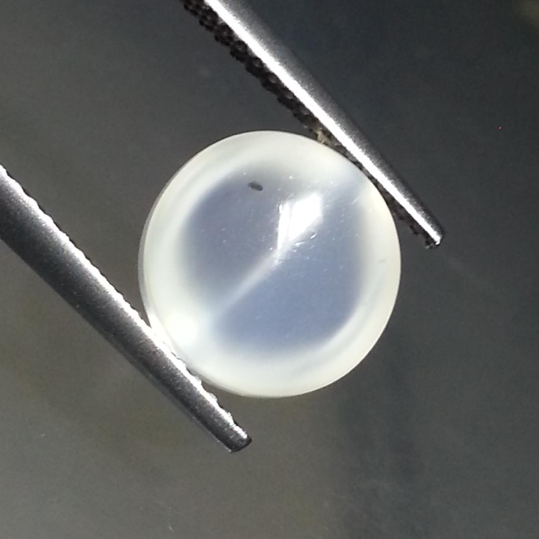 Fantastic Natural Moonstone Cat's Eye- 2.70 ct: Item: Fantastic Natural Moonstone Cat's Eye- 2.70 ct Loose Gemstone: Moonstone Cat's Eye Color/Clarity: VVS Carat Weight: 2.7 Size (mm): 9.20 x 9.20 x 4.50 Round - Srilanka No Reserve: This lot starts