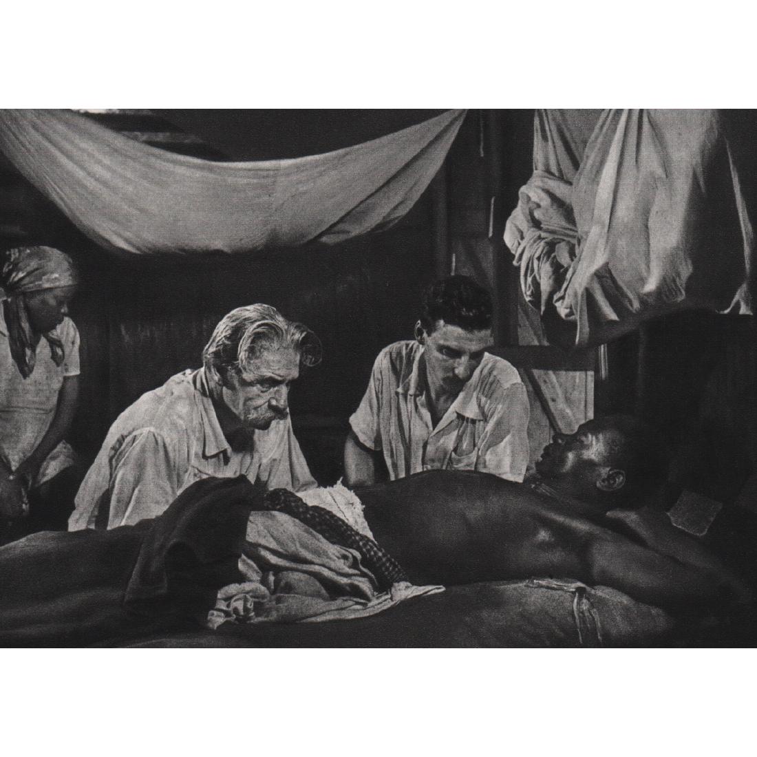 W. EUGENE SMITH - Dr. Albert Schweitzer, 1954: Artist: W. EUGENE SMITH Print Title: Dr. Albert Schweitzer, 1954 Medium: Sheet-Fed Gravure Printing Date: 1970's Printed in France Image Size: 7 x 5.25 inches William Eugene Smith (1918-1978) was an A