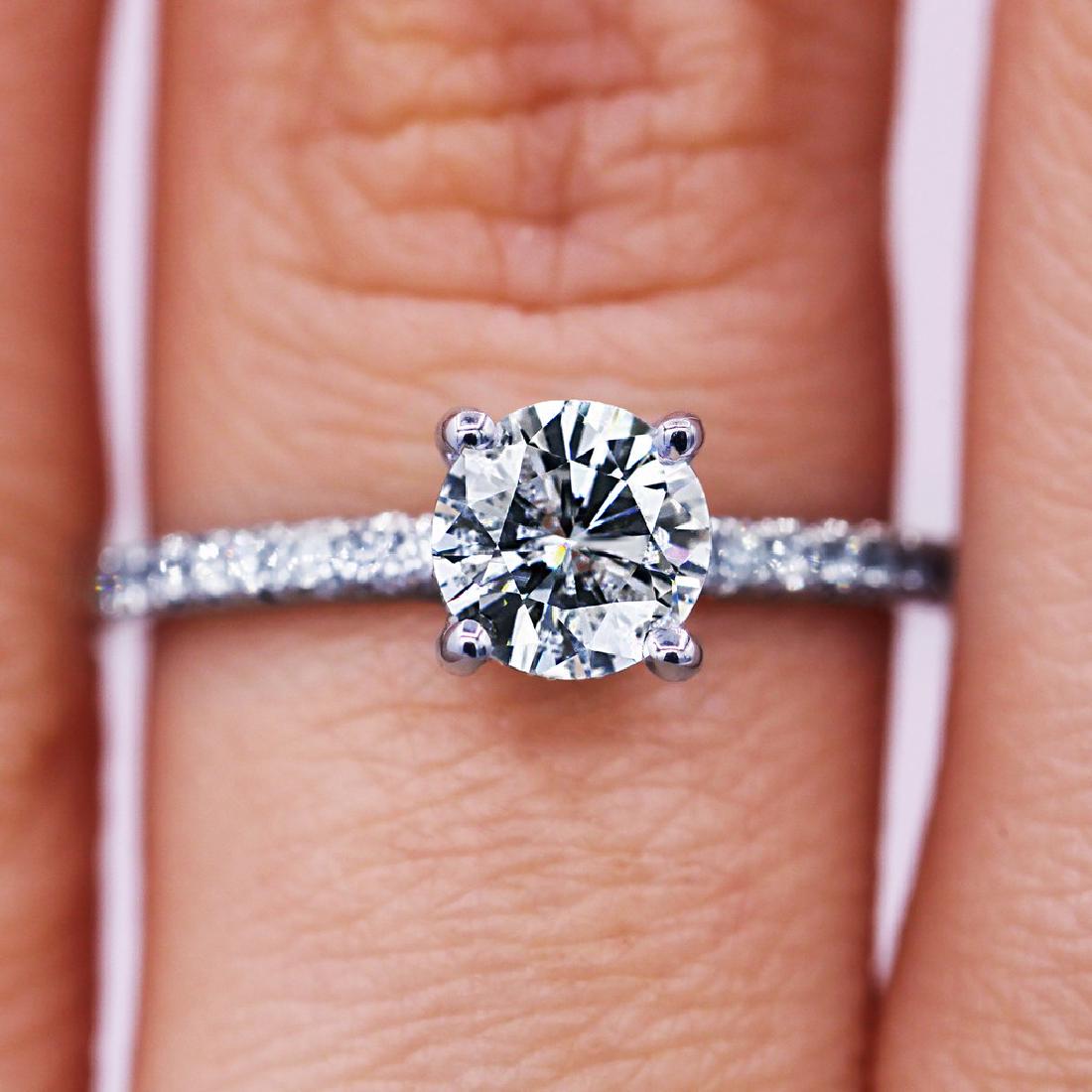 Sparkling 1.03 TCW round cut diamond pave engagement (1 of 5)