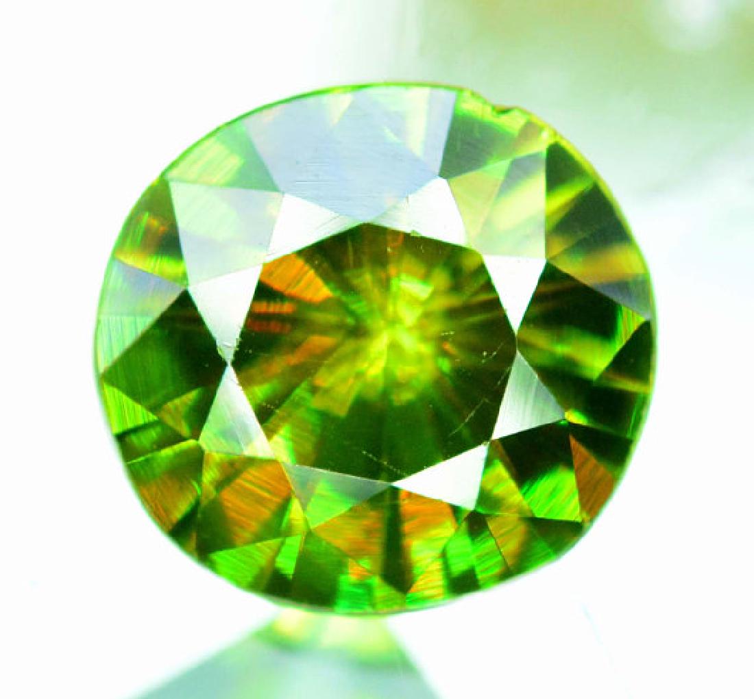 1.65 cts Rare Extreme Full Fire Green Sphene Titanite ~: Reserve Reduced! 1.65 cts Rare Extreme Full Fire Green Sphene Titanite ~ Weight : 1.65 cts Dimensions ~ 7*7*4 mm Origin : Skardu Pakistan Treatment : Natural DHL Global Shipping; 1.65 cts Rare Extreme