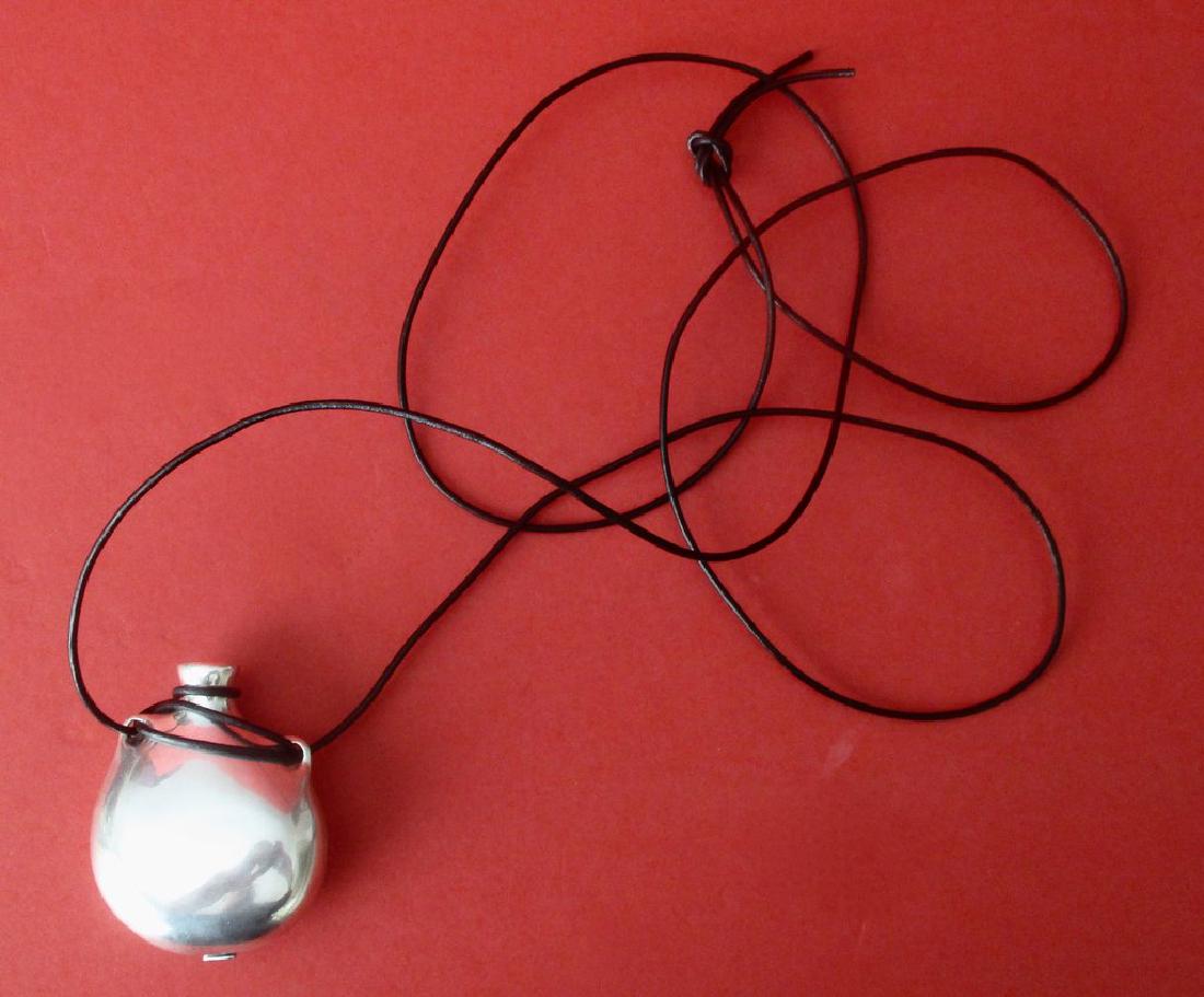 Sterling Silver Vase Pendant: Sterling Silver Vase Pendant circa. 1980 American Sterling silver large vase pendant in the manner of Elsa Perretti at Tiffany's Marked "sterling" on bottom. New black leather cord is 55 inches There