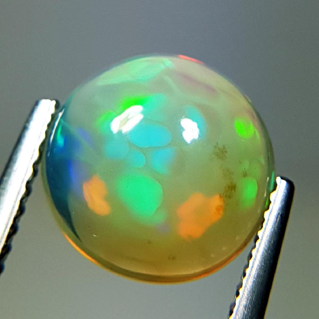 1.95 ct Awesome Fire Round Cabochon Natural Opal (1 of 10)
