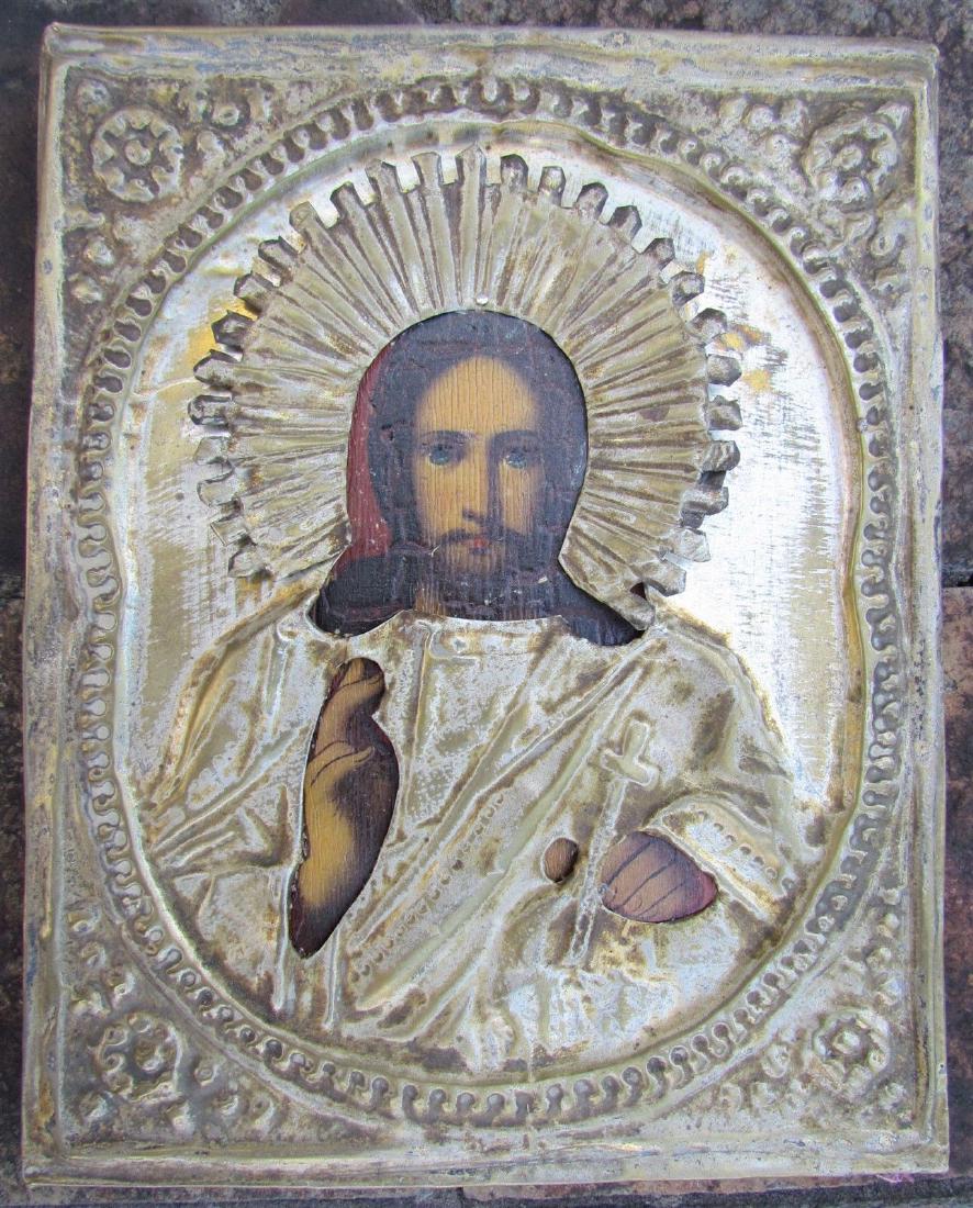 19th CENTURY RUSSIAN ANTIQUE ICON OF CHRIST PANTOCRATOR: 19th CENTURY RUSSIAN ICON OF CHRIST PANTOCRATOR. Metal oklad. Size 7 1/8 by 5 1/2" Hand painted with egg tempera. Authenticity guaranteed. Certificate of the Authenticity available upon request. (25)