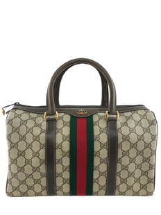 Gucci Monogram Boston Web Medium Satchel Bag: Imagine this gorgeous authentic Gucci Monogram Boston Web Medium Satchel Bag crafted from signature monogram GG canvas with a brown leather trim on your arm! This stylish bag features double top handl