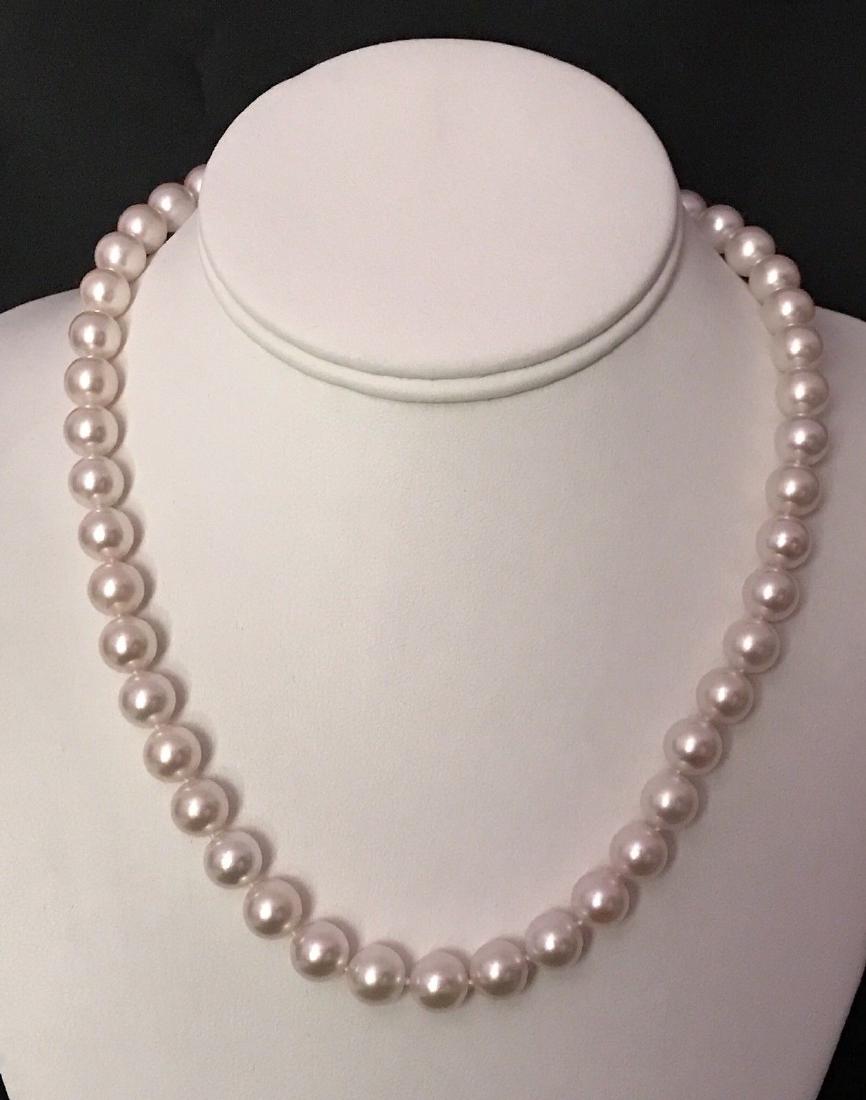 Certified $29,450 Mikimoto Akoya Pearl 9.5 mm 18Kt: This elegant Mikimoto estate necklace has been evaluated in the amount of $29,450 by Gemological Appraisal Laboratory 580 Fifth Avenue New York, New York 10036 46 Stunning Pearls individually knotted 