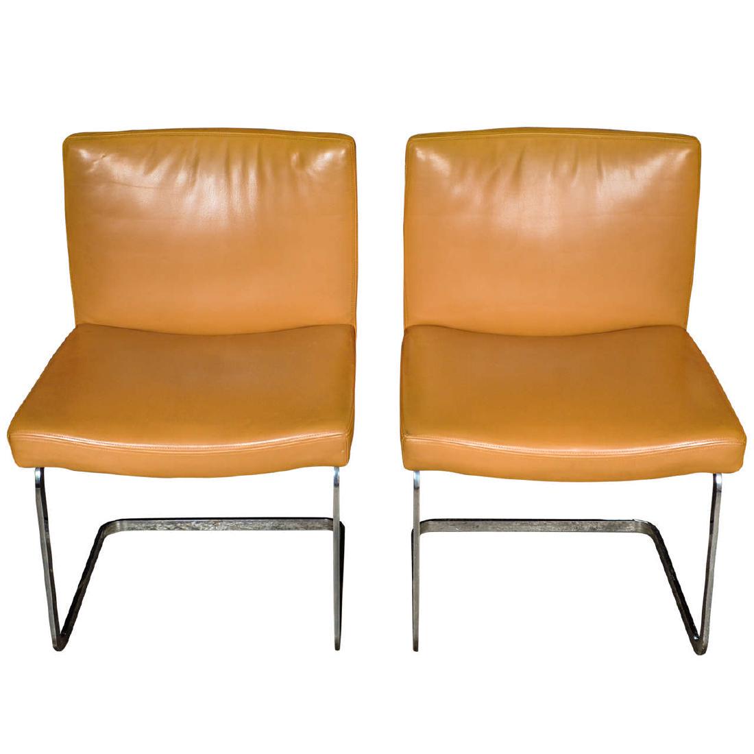 set of 8 freischwinger dining room chairs by: Unique and rarely available set of 8 dining room chairs designed by Jean-Pierre Dovat for Swiss top-end manufacturer De Sede. Beautiful tanned camel colored leather in as-if-new condition on an elegan