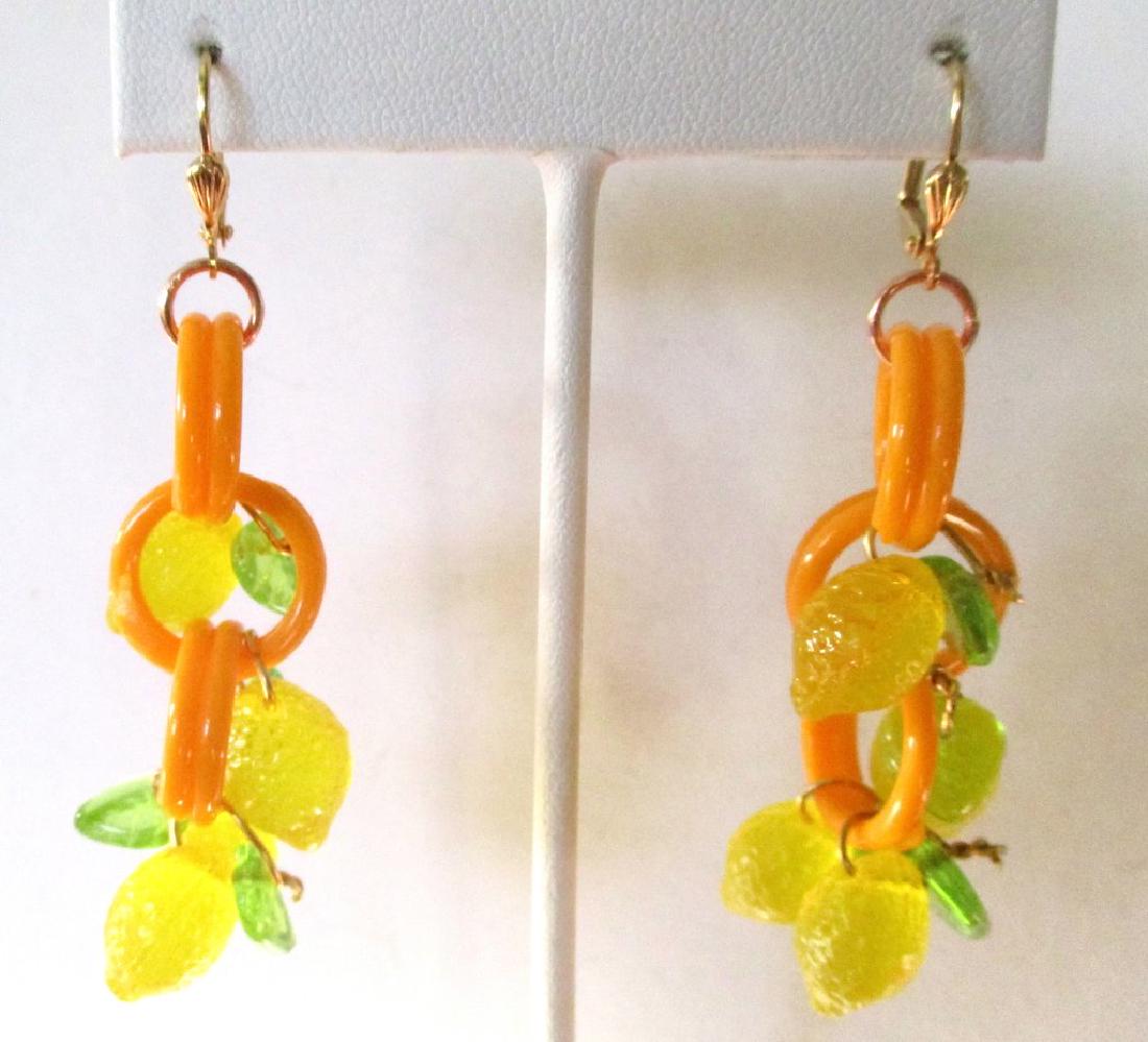 Pair of Vintage Celluloid & Czechoslovakian Crystal: Pair of Vintage Earrings Circa. 1940 American Orange celluloid links with Czech crystal lemon and leaf beads. Wires have been replaced with new brass wires. Each earring measures 2 1/2 inches in lengt