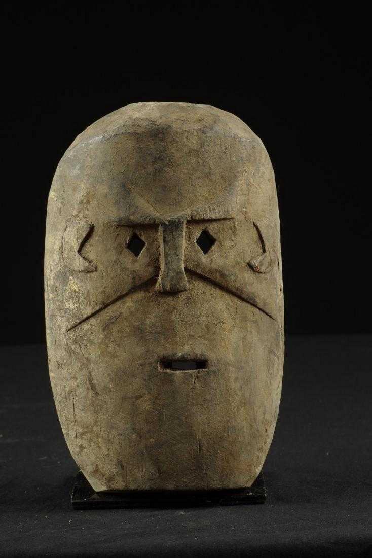 Old mask with close set eyes (1 of 9)